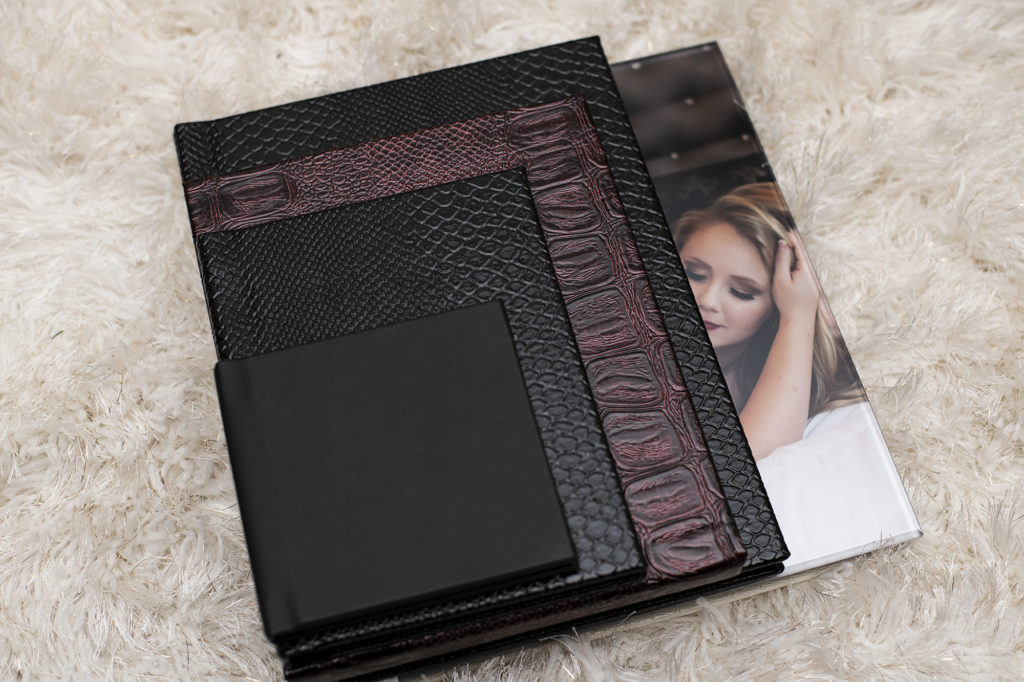 boudoir albums with variety of textured covers