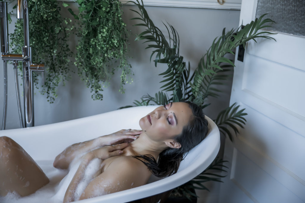 Nashville Boudoir Photography. Woman laying in the bathtub.